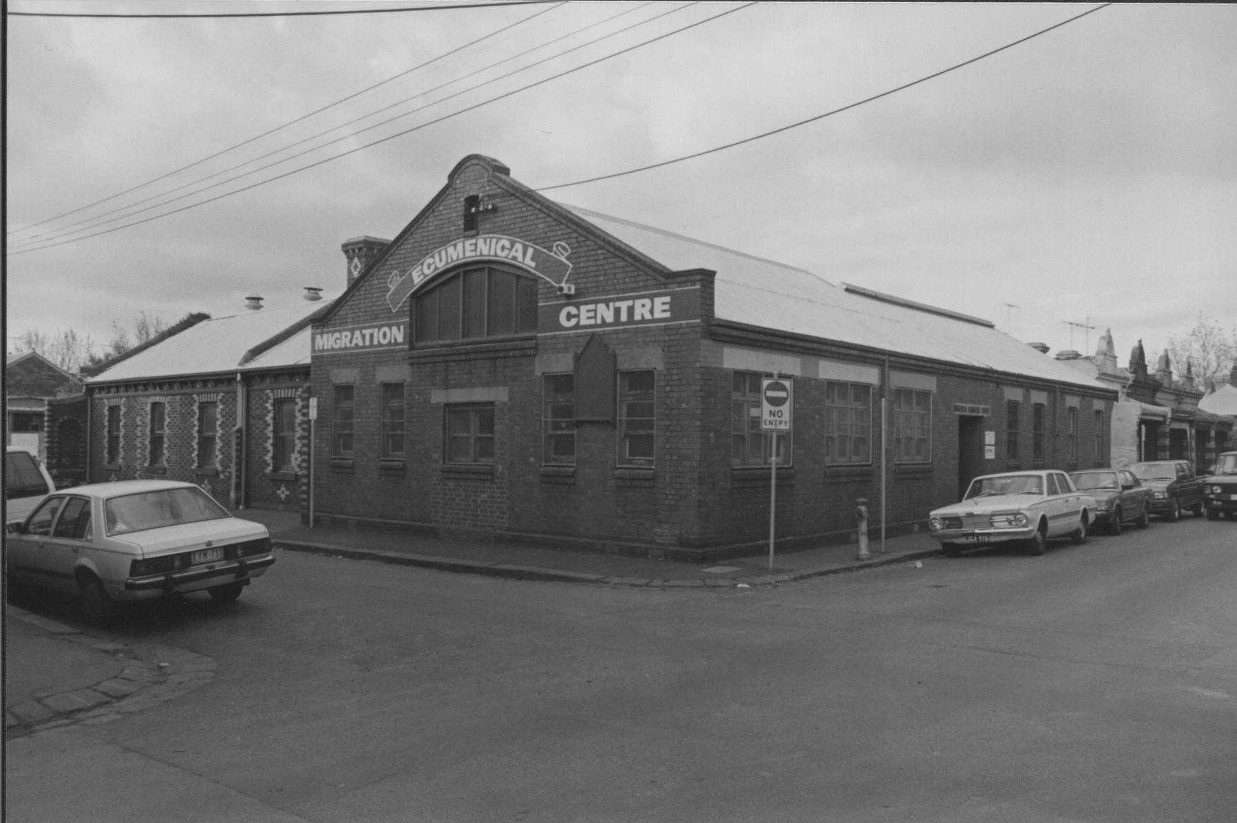 A black and white photograph of the Ecumenical Migration Centre